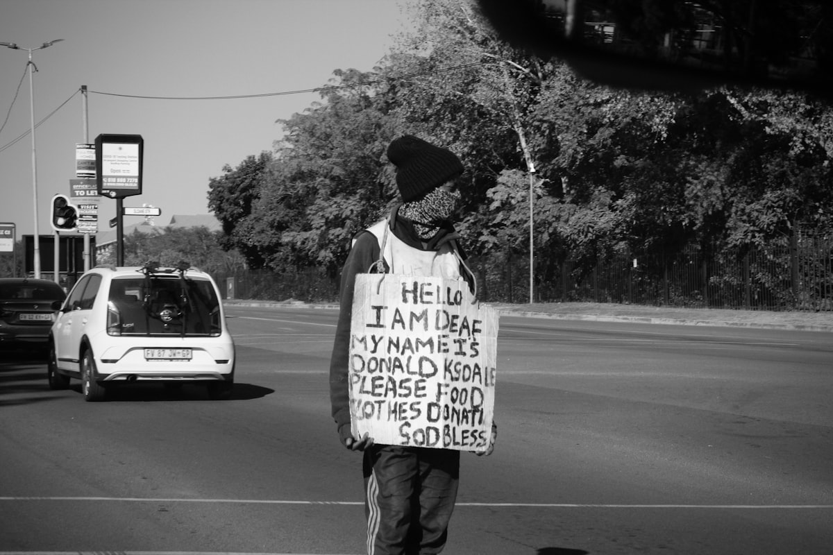 A city skyline with contrasting modern towers and older buildings