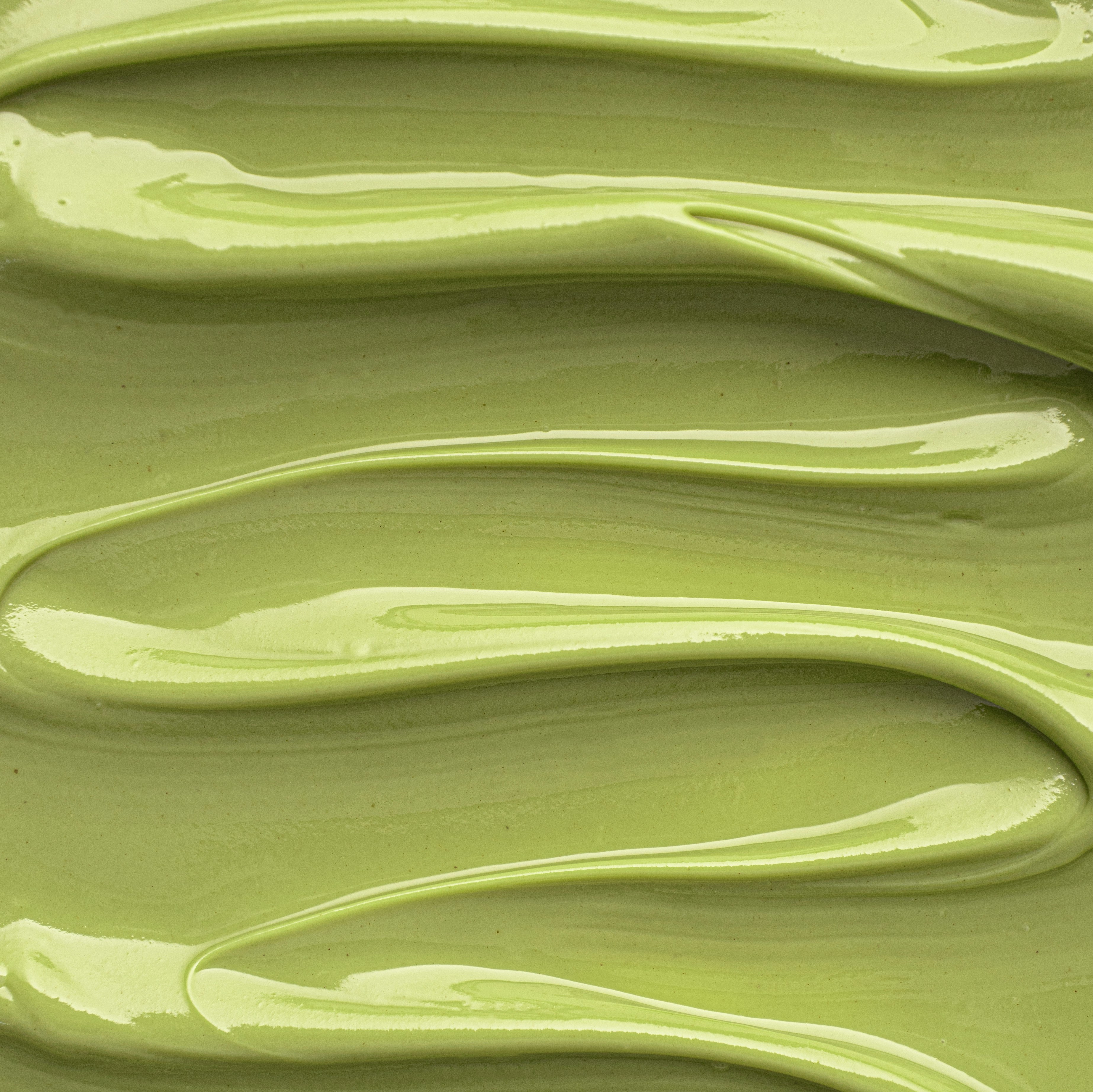 a close up view of a green liquid