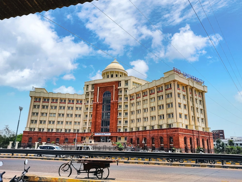 a very large building with a bike parked in front of it