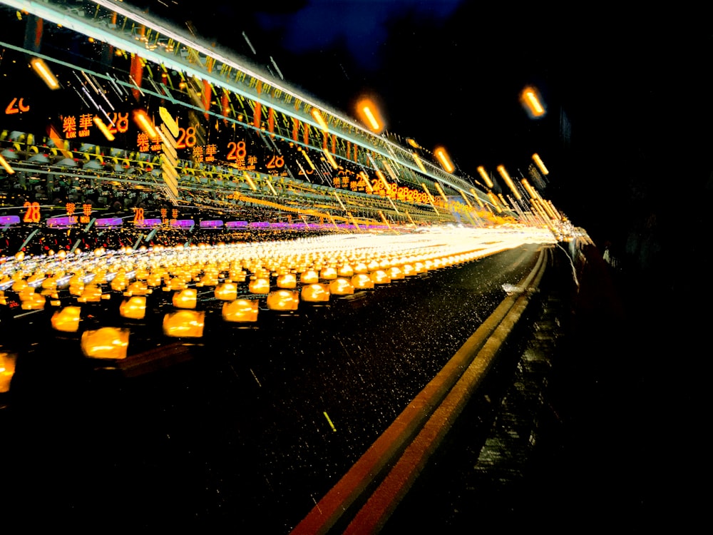 a bunch of lights that are on a street