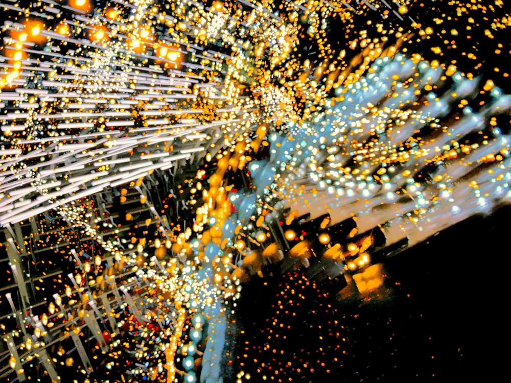 a large display of lights in a dark room