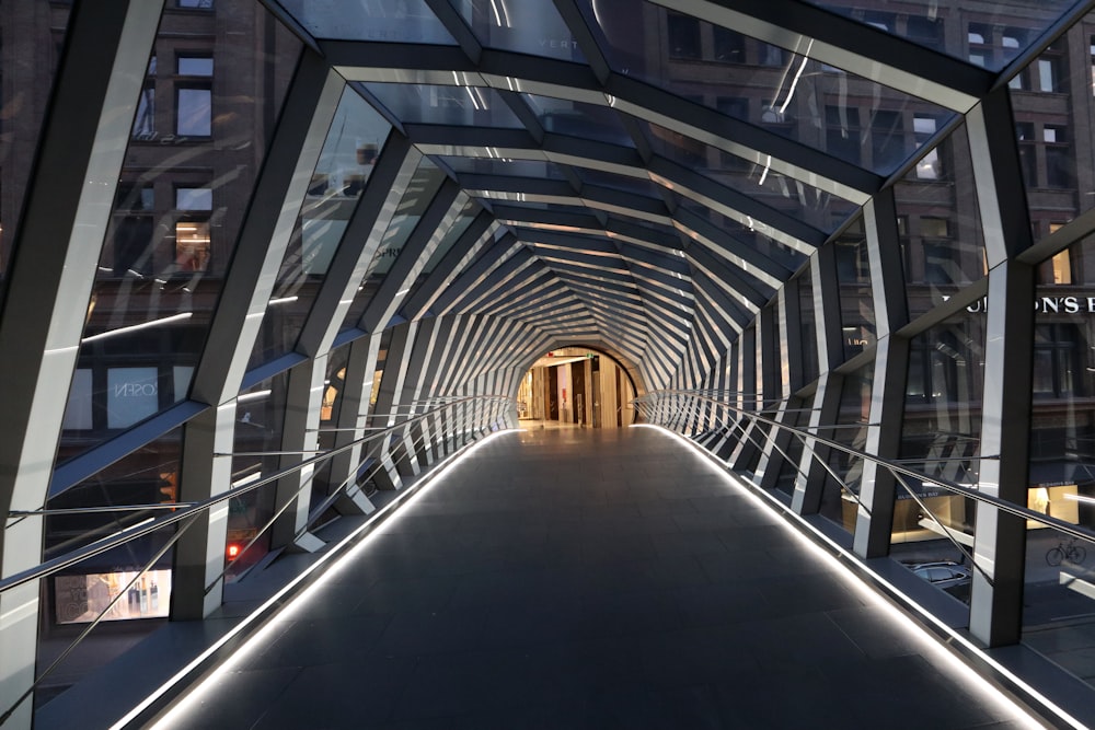 a very long walkway with a lot of windows