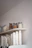 A bright kitchen counter with a stack of colorful disposable cleaning cloths neatly arranged.