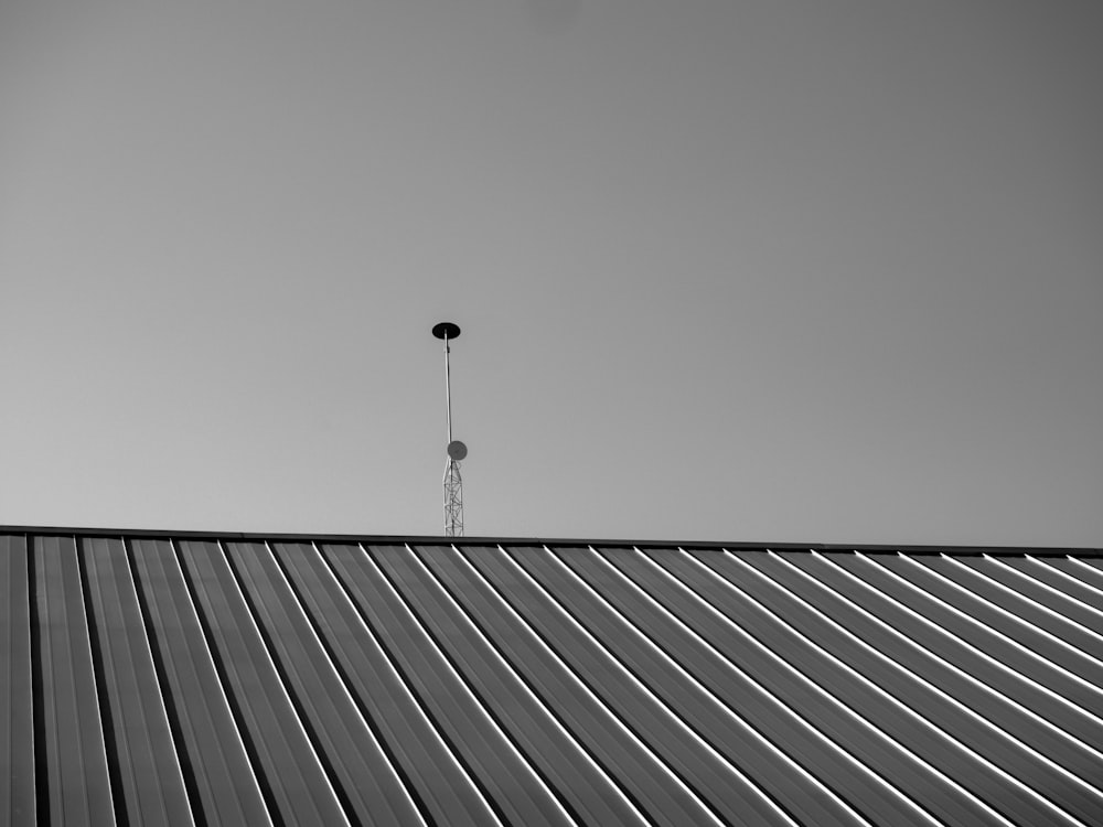 a black and white photo of a metal roof