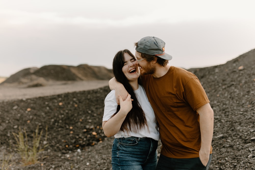 a man and a woman standing next to each other