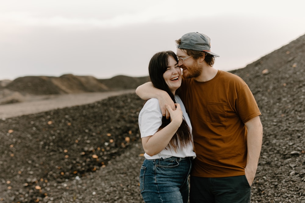 a man and a woman standing next to each other