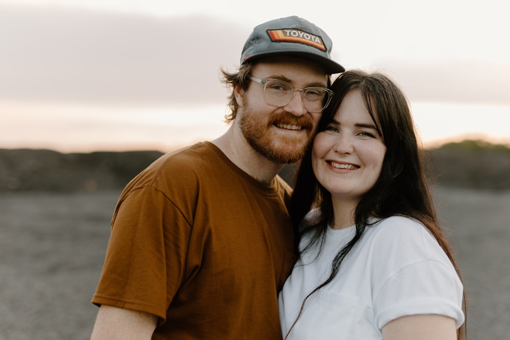 a man and a woman posing for a picture