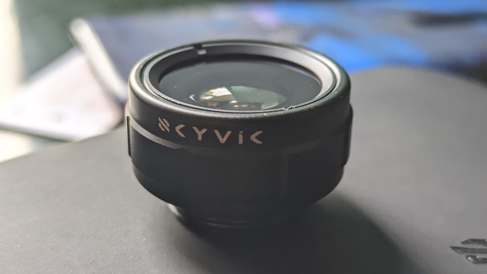 a close up of a camera lens on a table