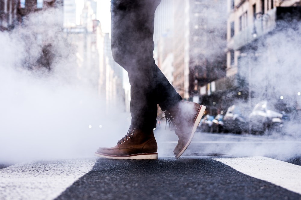 a person standing in the middle of a street