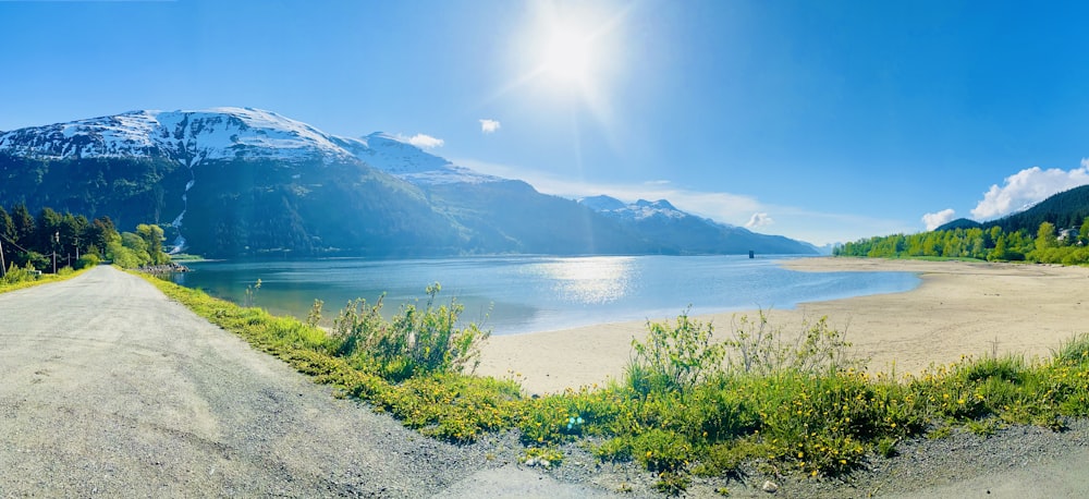 a scenic view of a lake and mountains