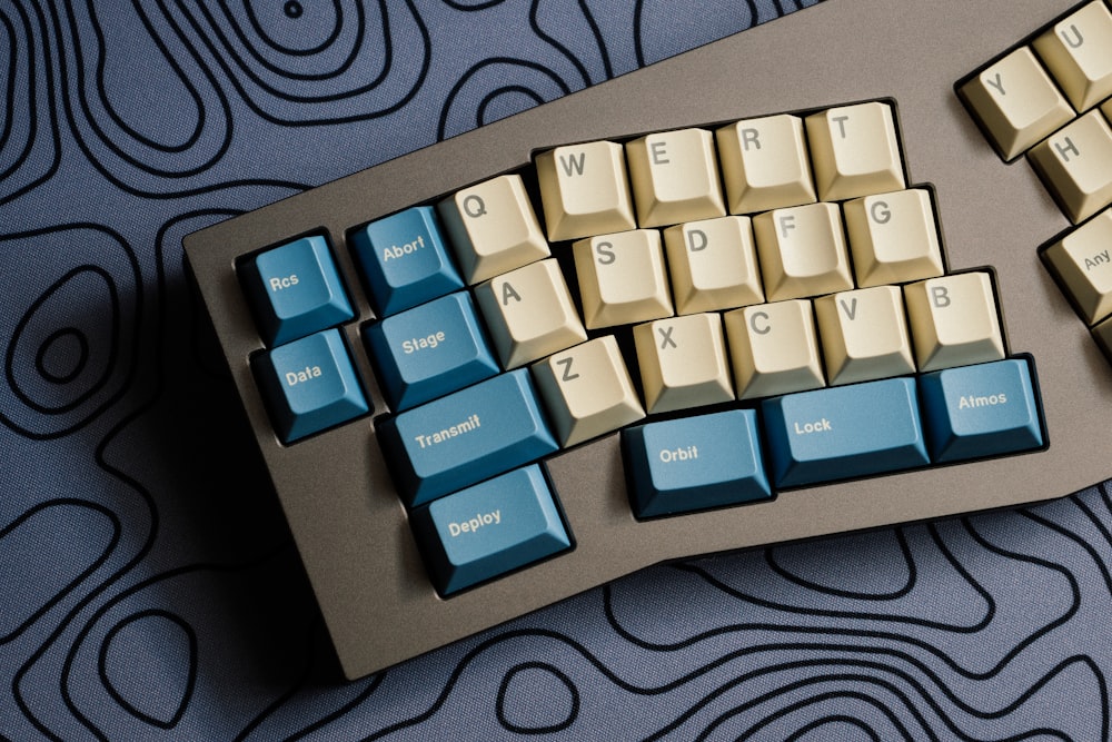 a computer keyboard sitting on top of a table