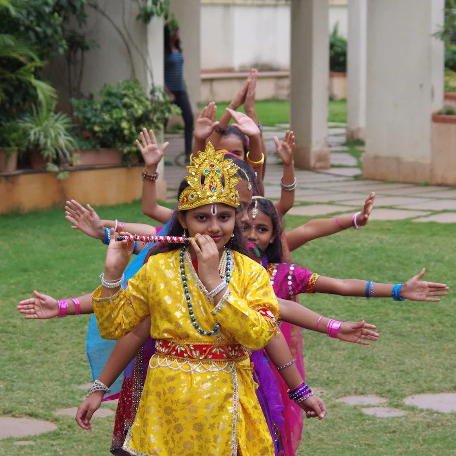 Children celebrating Janmashtami festival with decorations and dance