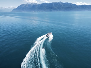 a boat traveling across a large body of water