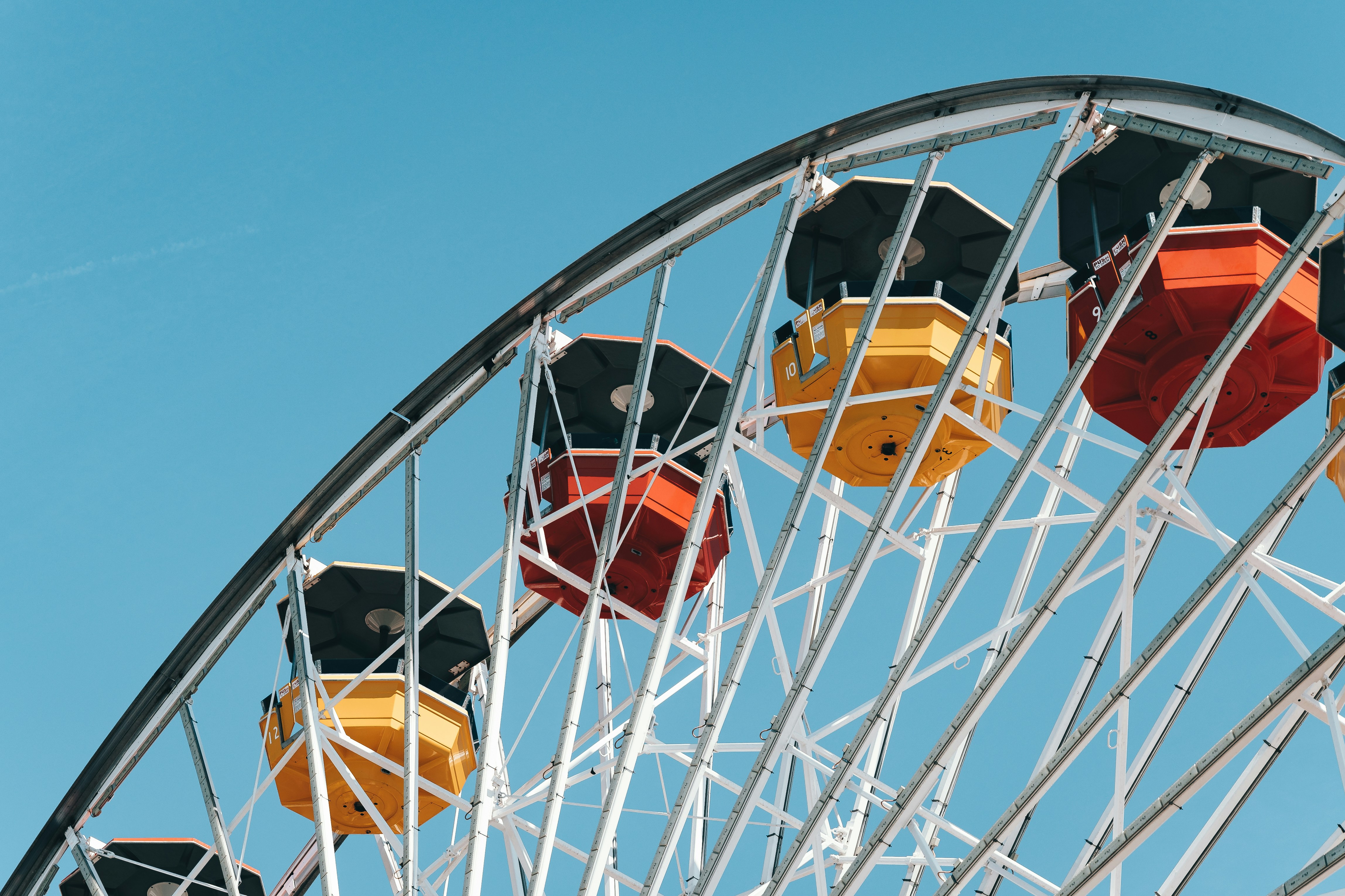 a ferris wheel with a blue sky in the background