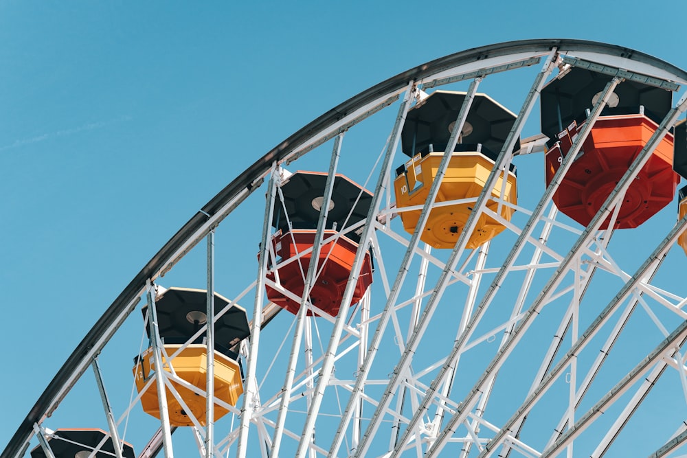 a ferris wheel with a blue sky in the background