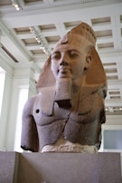 An ancient Egyptian artifact displayed in a museum setting.
