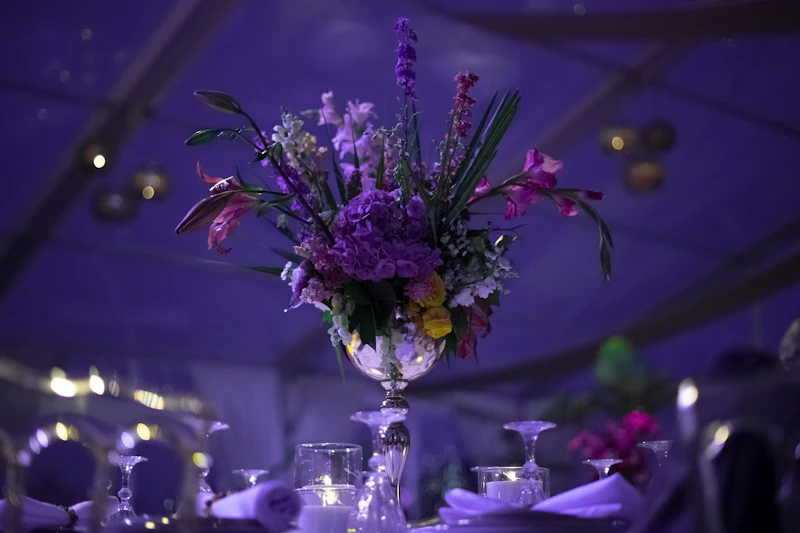 Dramatic tall floral centerpiece at a gala event