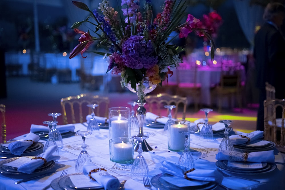 a table is set for a formal dinner