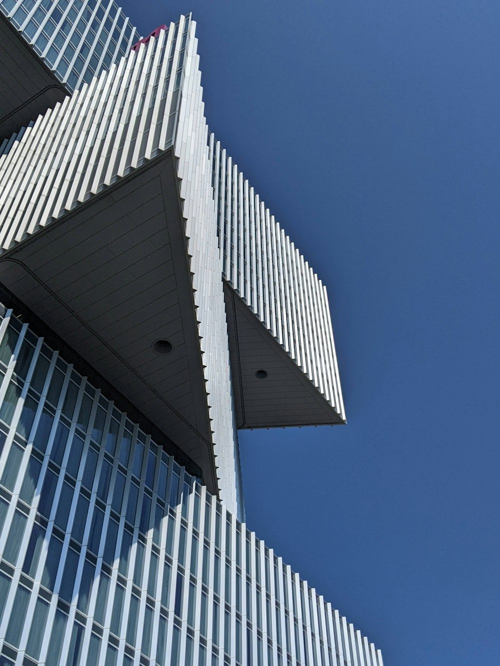 a very tall building with a sky in the background