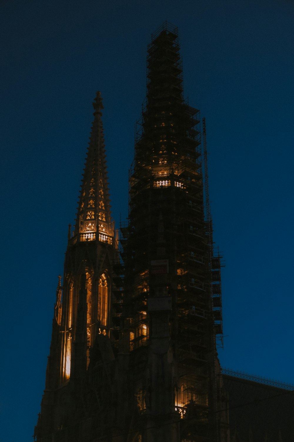 a very tall building with a clock on it's side