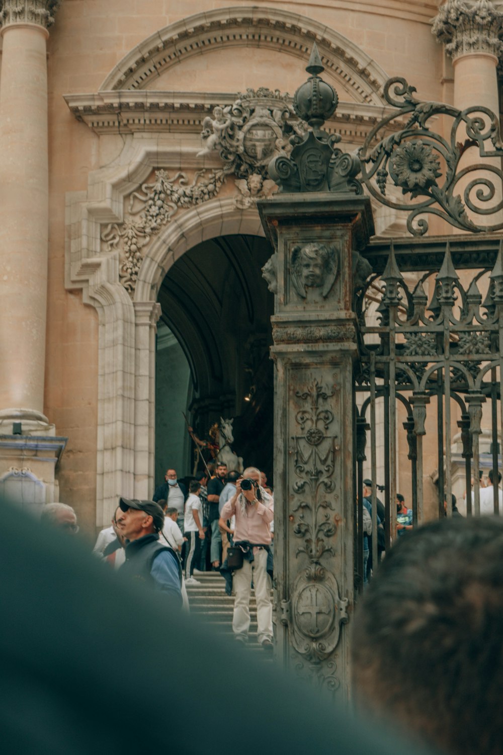 a group of people standing in front of a building