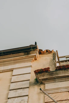 a tall building with a clock on the side of it