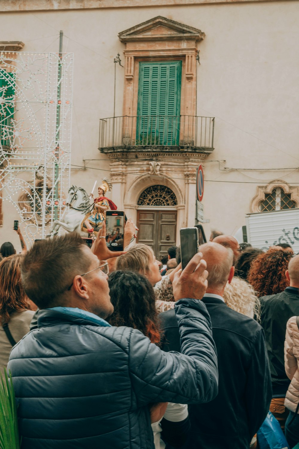 a group of people standing in front of a building