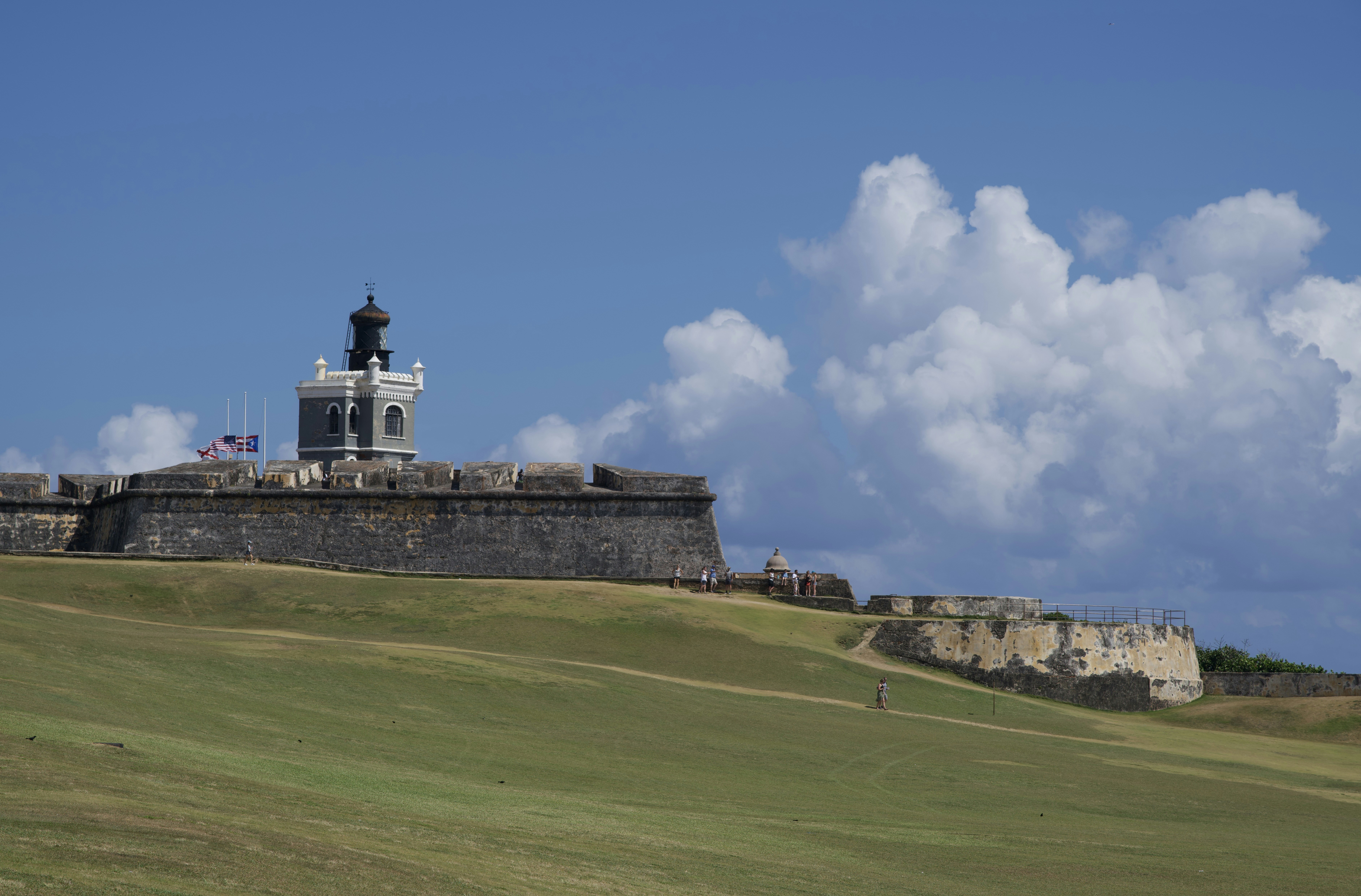a view of a tower on top of a hill