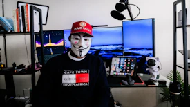 a person wearing a mask and a red hat