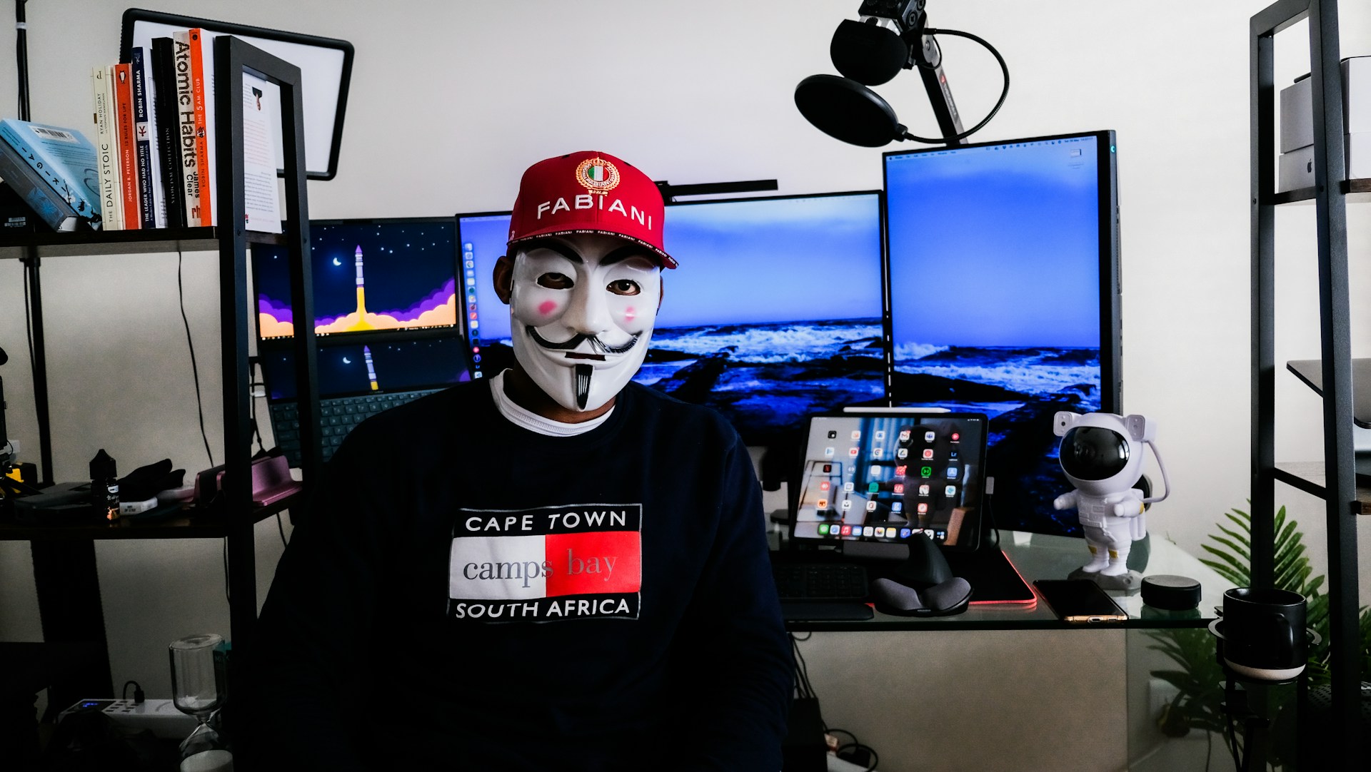 a person wearing a mask and a red hat