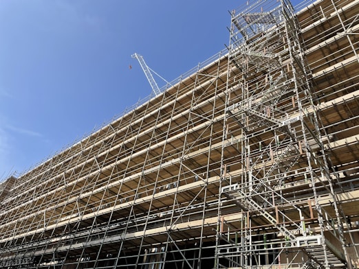 a very tall building with lots of scaffolding on it