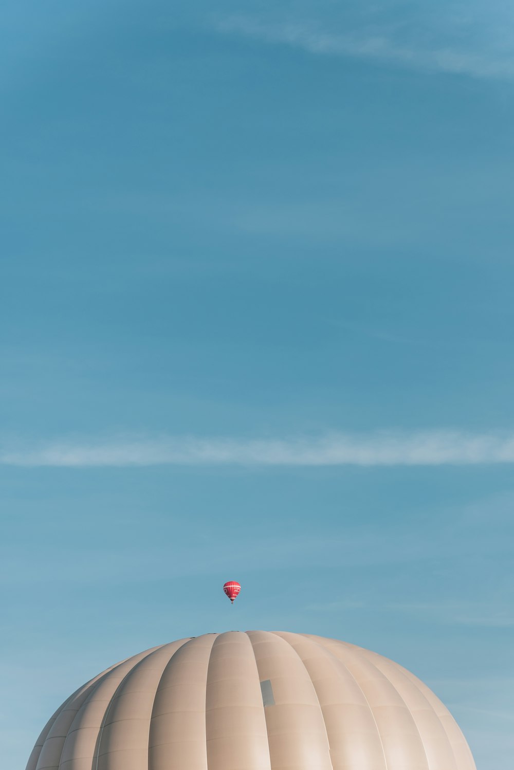 a hot air balloon flying in the sky