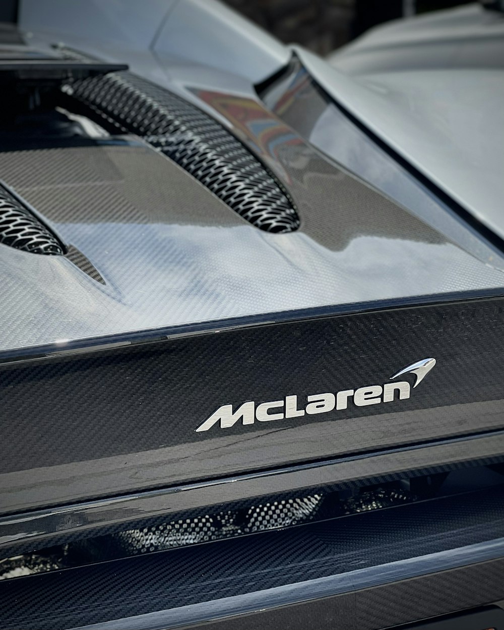 a close up of the front of a sports car