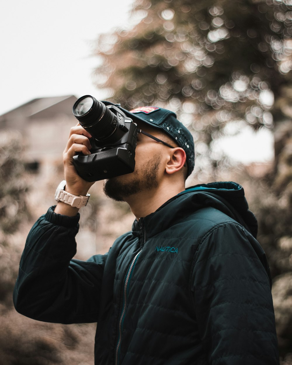 a man taking a picture with a camera