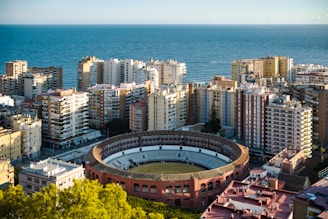 an aerial view of a city by the ocean