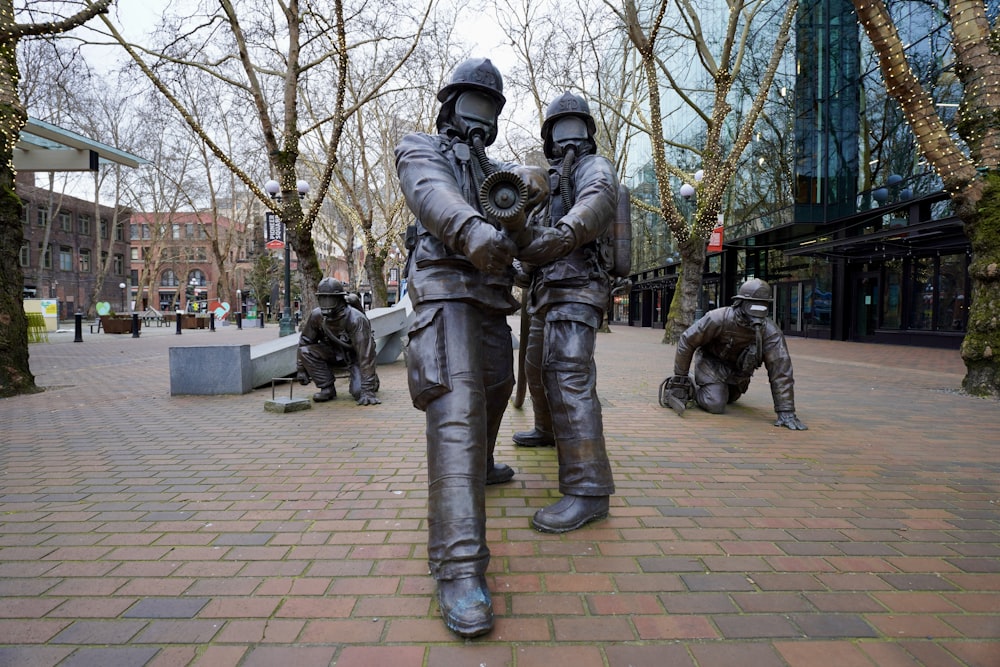 a statue of two men holding each other