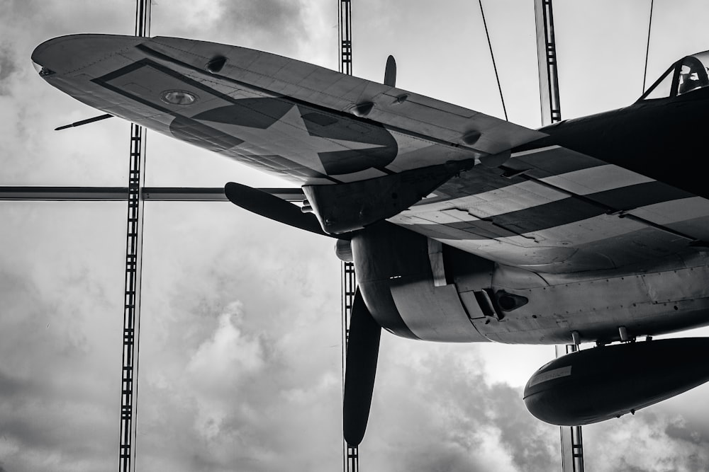 a black and white photo of an old airplane