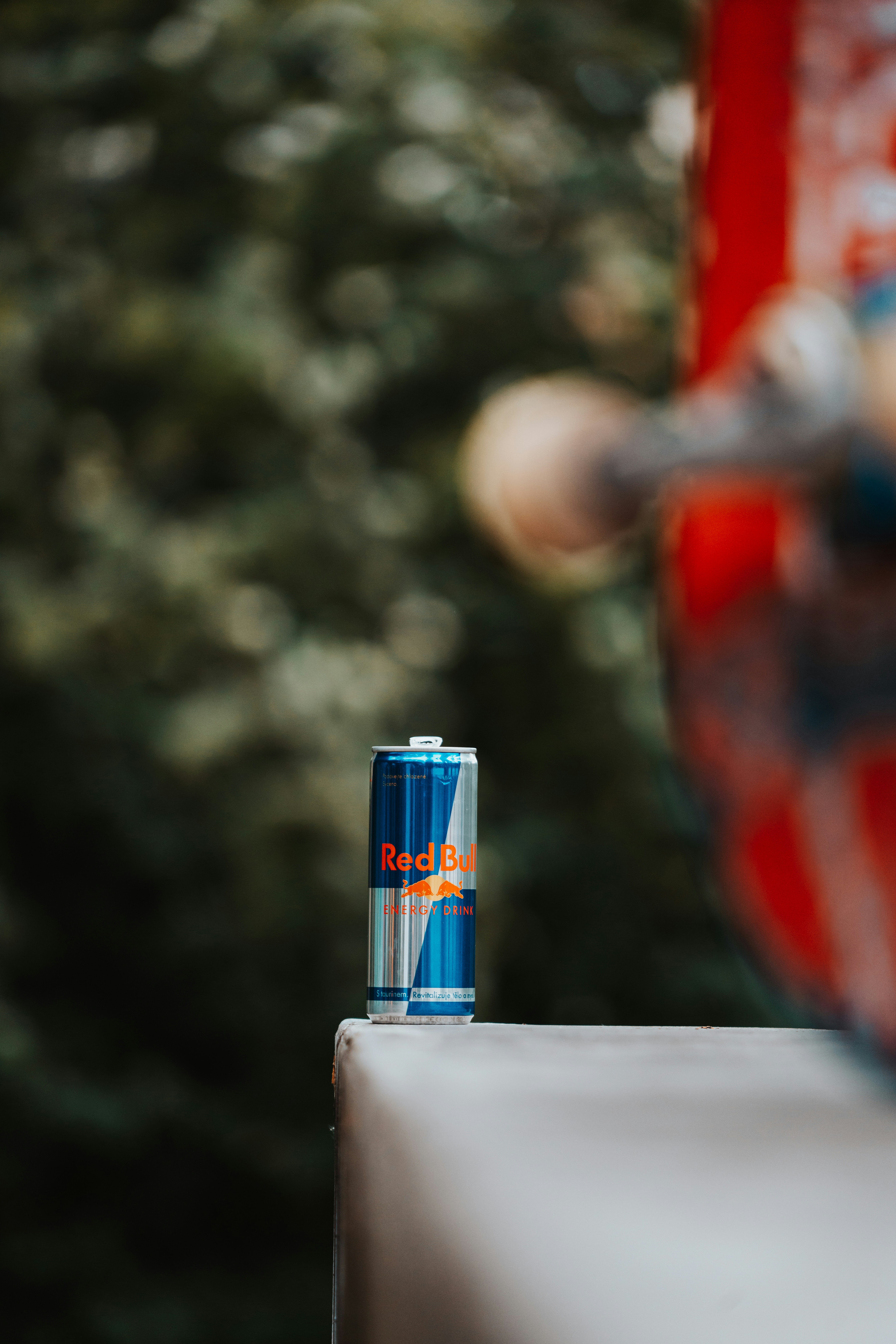 a can of soda sitting on top of a table