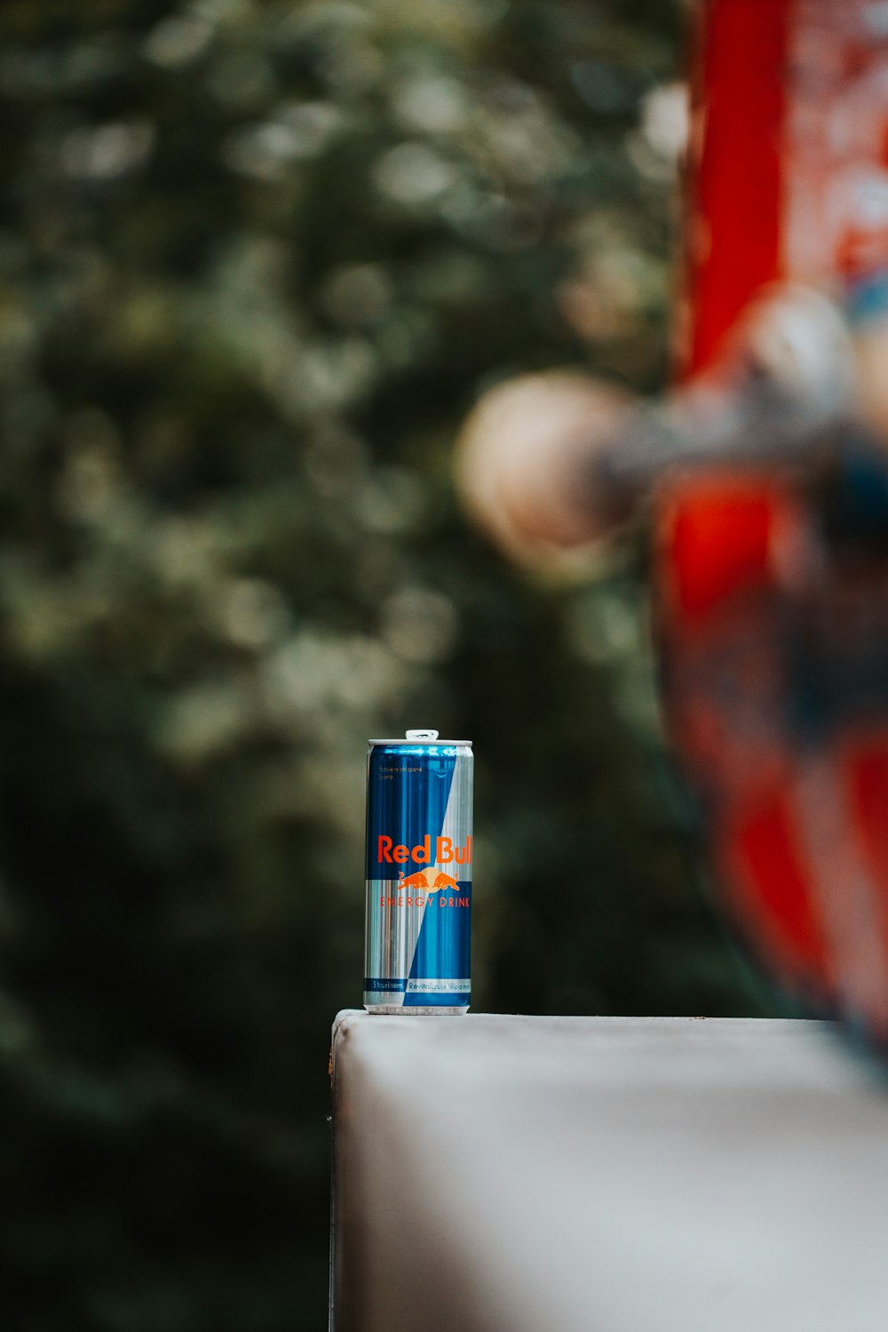 a can of soda sitting on top of a table