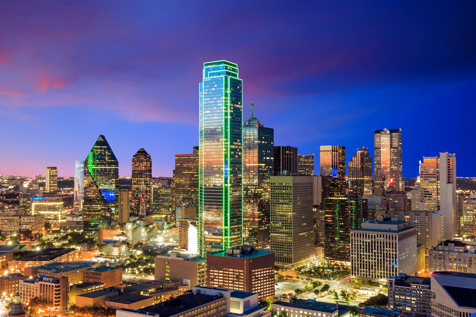 The Dallas skyline lit up at dusk
