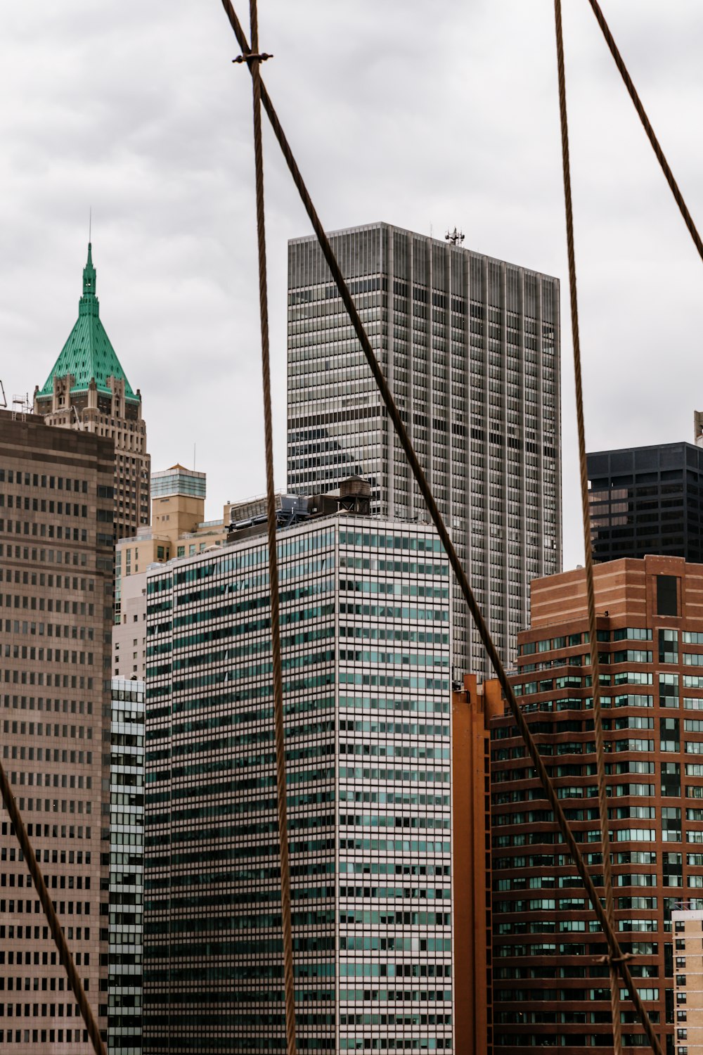 a view of some very tall buildings in the city