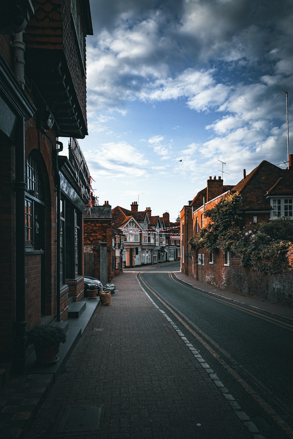 a street with a few buildings on both sides of it