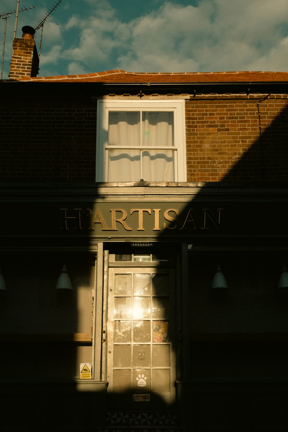 a building with a sign that says hartigan on it