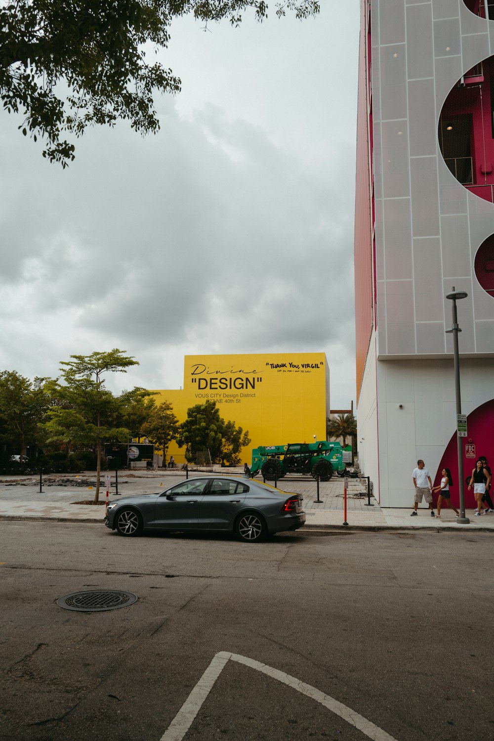 a car is parked in front of a building