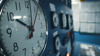 a close up of a clock on a wall