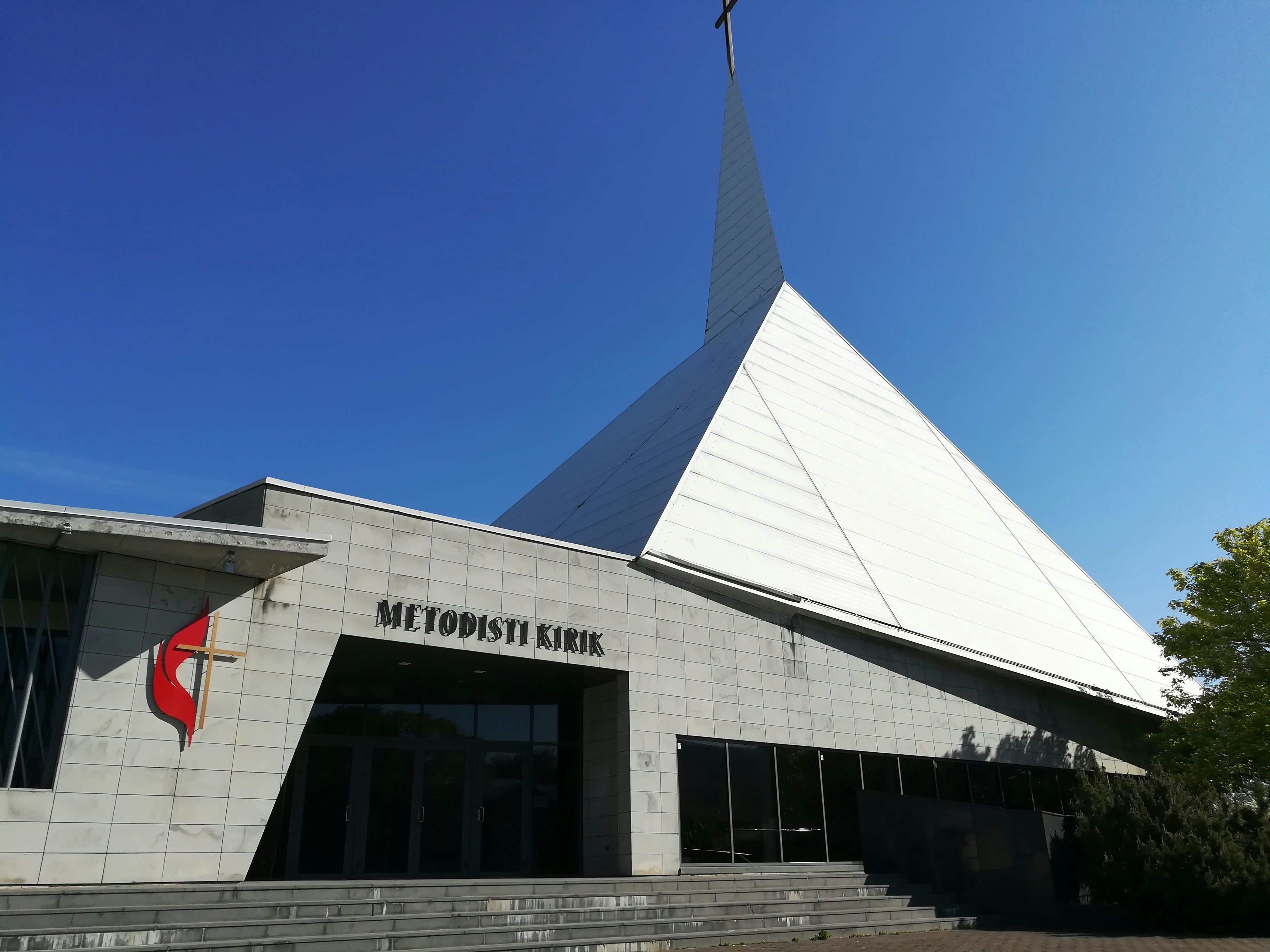 a building with a steeple on top of it