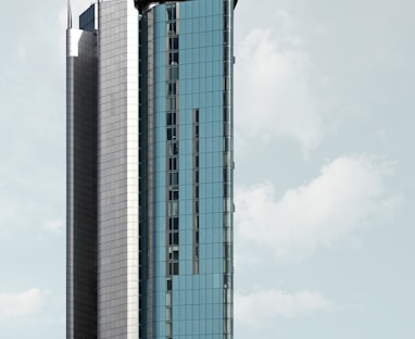 a tall building with a sky background