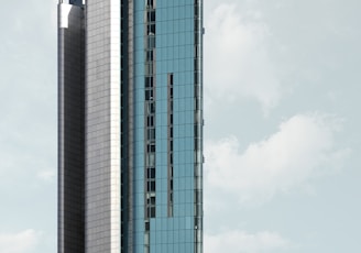 a tall building with a sky background