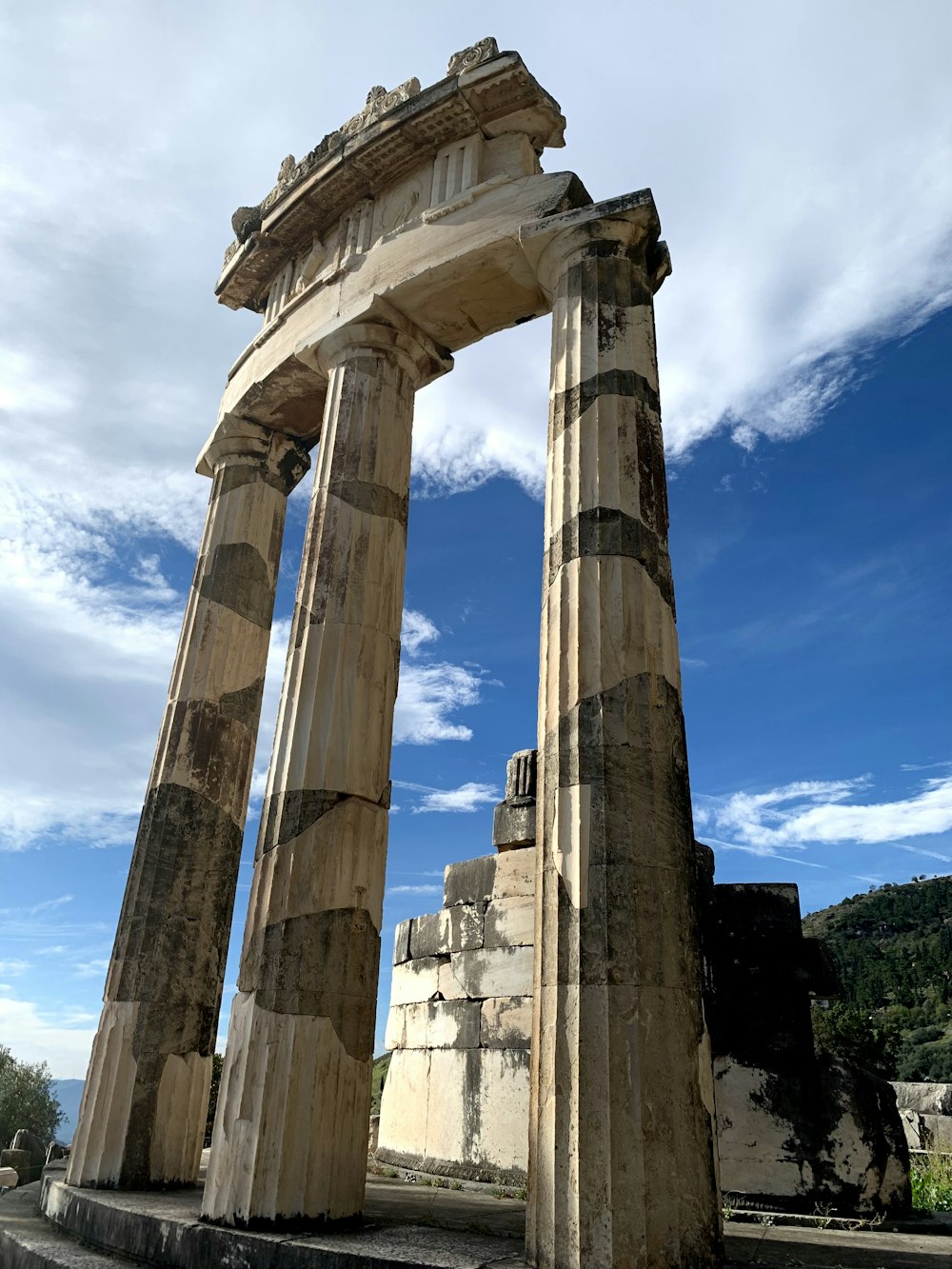 a large stone structure sitting on top of a field