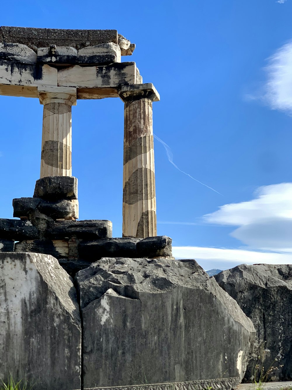 a large stone structure sitting on top of a pile of rocks